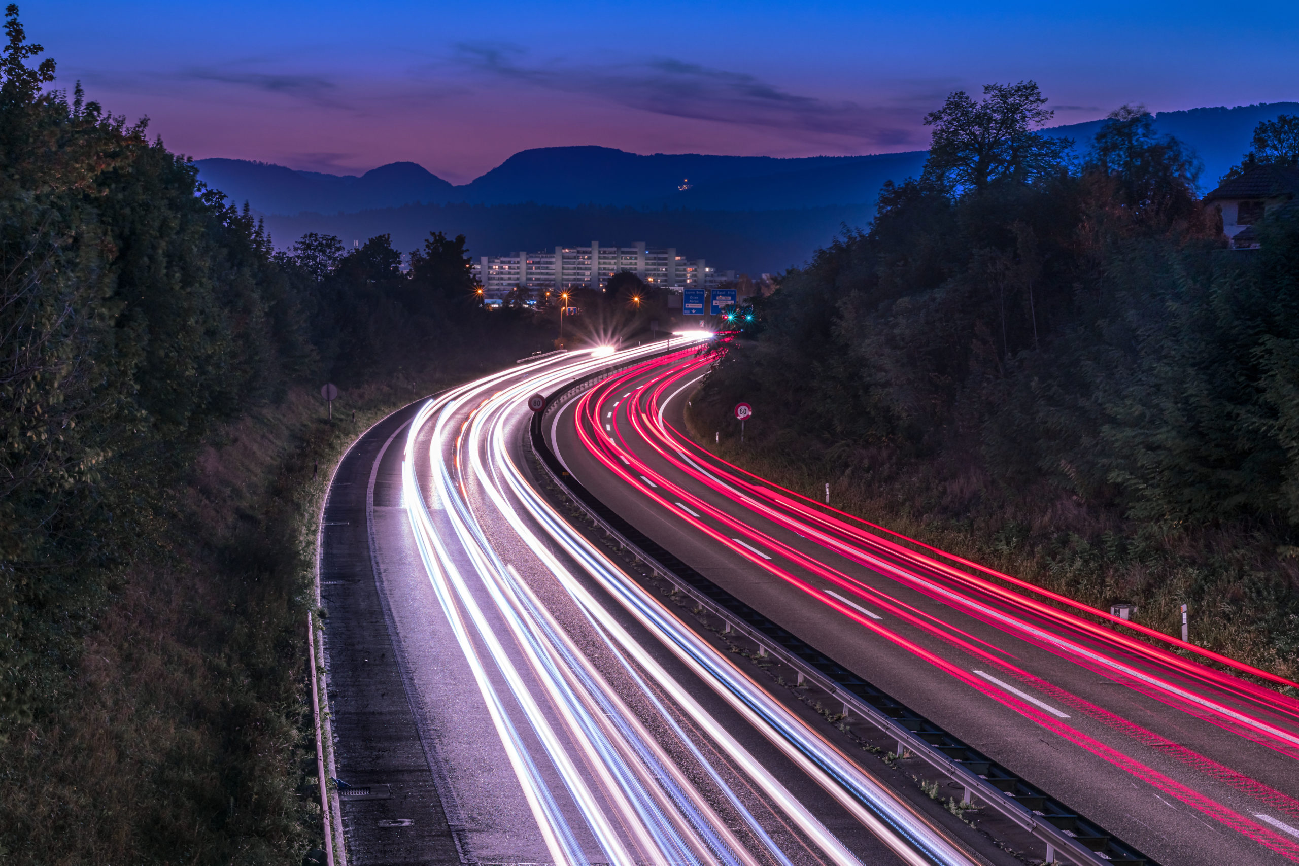 Light trails on the Aaretalstrasse - View at dusk from a bridge over the Aaretalstrasse in Aarau Rohr. 