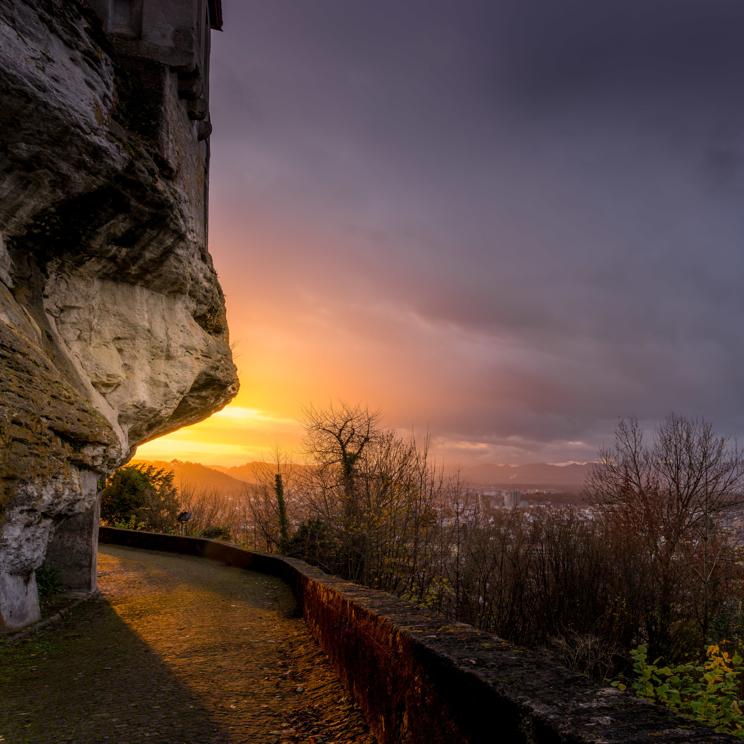 Schloss Lenzburg - On the way around Schloss Lenzburg. Beautiful sunset after a mostly rainy and cold day. Just around the bend.