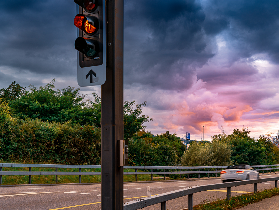 Made It! - Photograph made in Aarau on an evening of a day with changing weather conditions, showing dramatic, but also colorful clouds before sunset. 